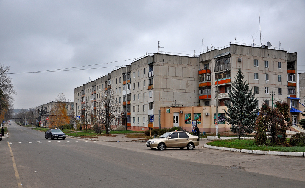 Кременная, Проспект Ленина, 6; Улица Титова, 7