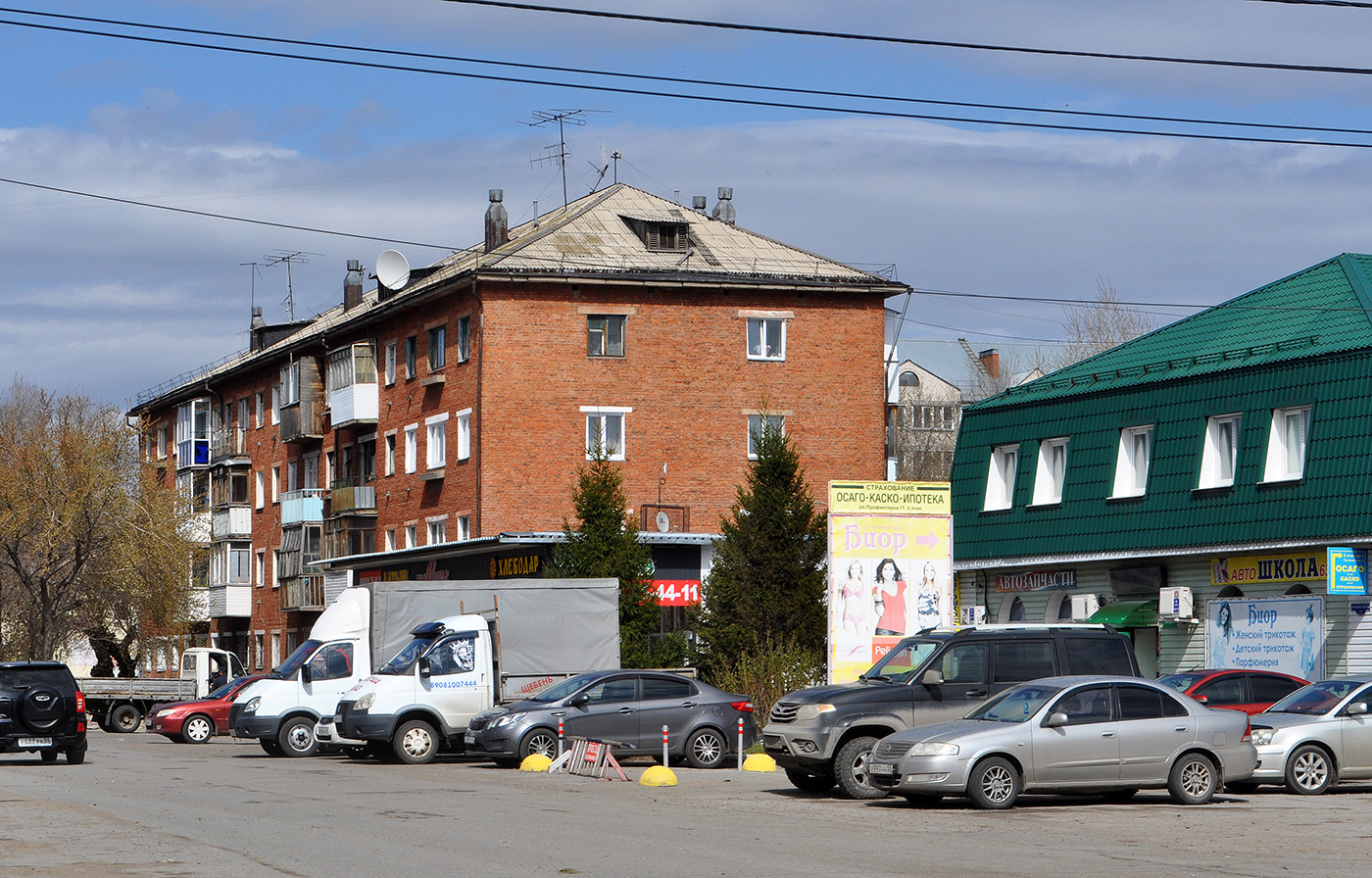 Омск, Улица Профинтерна, 9 / Хлебная улица, 25